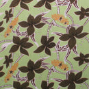 Green Large All Over Plumeria Glitter Polyester Fabric